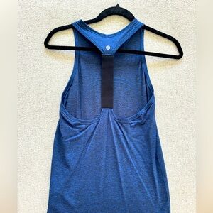 Blue Lululemon tech tank with a T back size 6